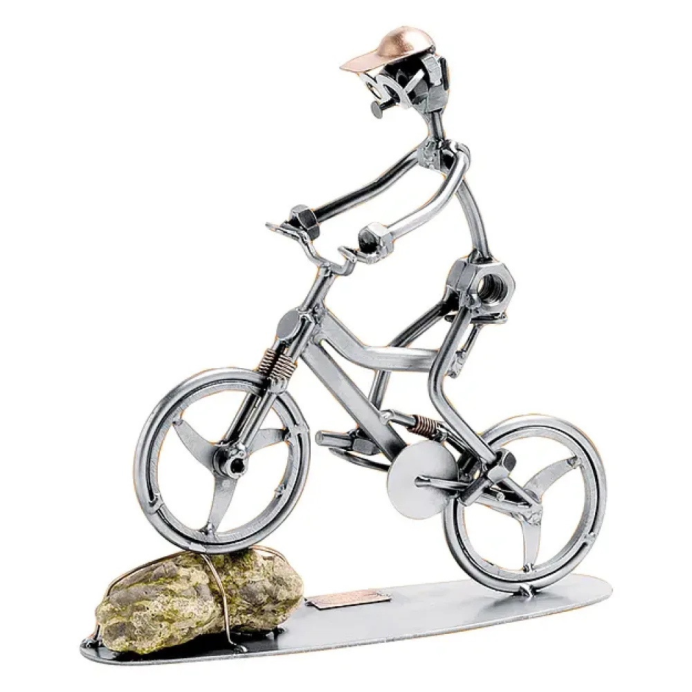 Schraubenmännchen Mountainbikefahrer mit Stein